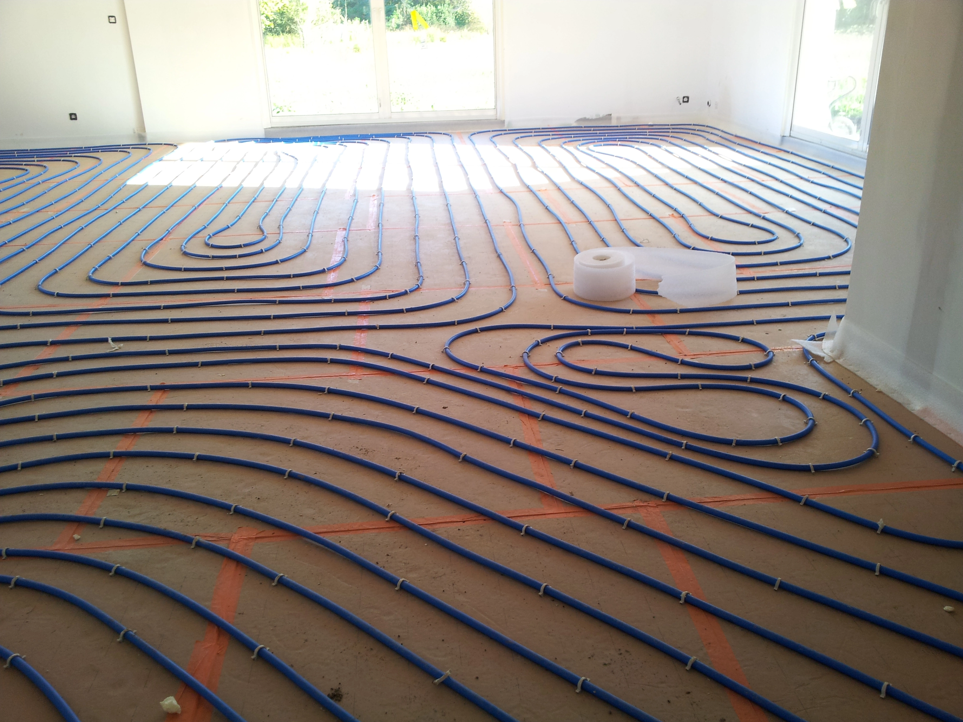 Plancher chauffant pompe à chaleur rénovation maison Lyon